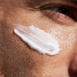 Close-up of a white cream application on skin