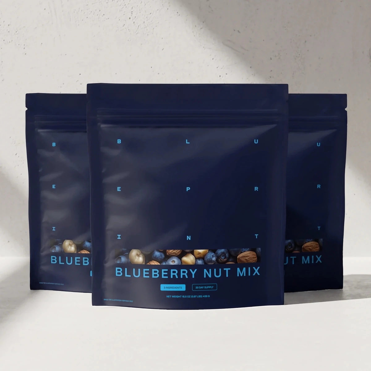 Three pouches of Blueprint Blueberry Nut Mix, a whole-food longevity snack
