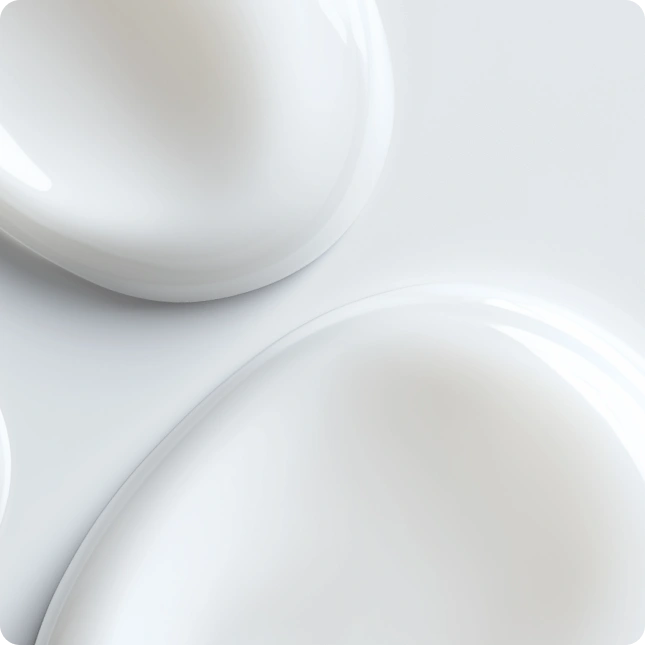 Close-up of facial moisturizer on a smooth surface