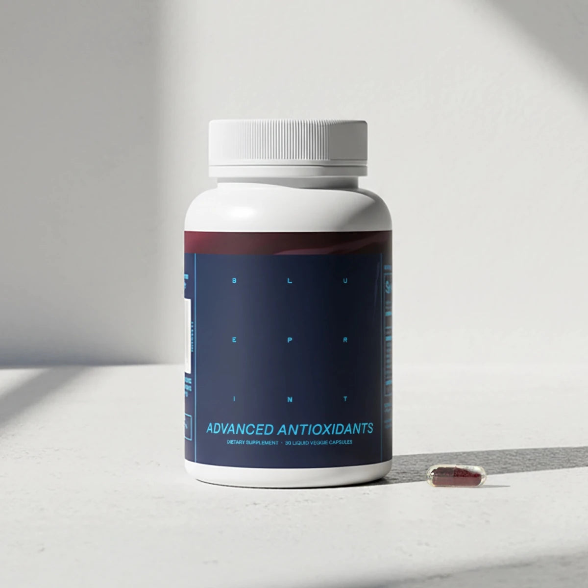 Bottle of 'Advanced Antioxidants' on a light surface with a neutral background