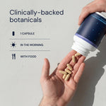 Hand pouring capsules from a supplement bottle onto a palm with text about clinically-backed botanicals.