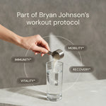 Hand pouring a supplement into a glass with 'Part of Bryan Johnson's workout protocol' text.