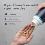 Bryan Johnson's essential longevity actives capsules being poured into a hand.