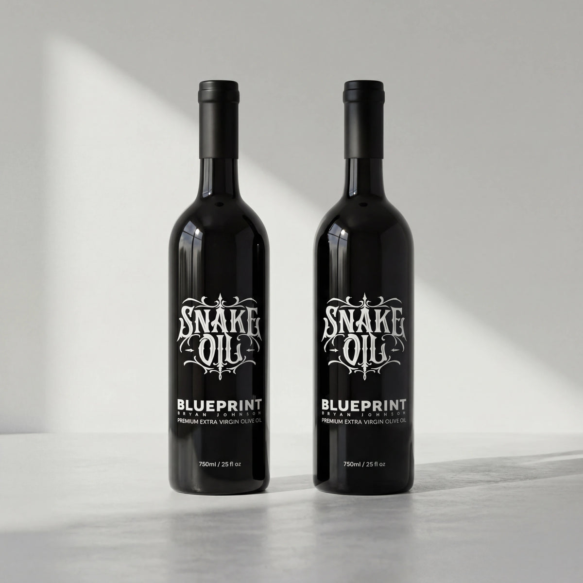 Two bottles of Snake Oil Blueprint on a light gray background