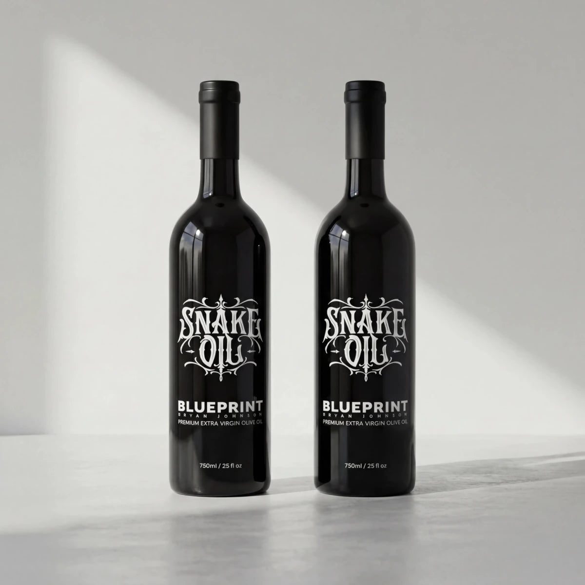 Two bottles of Snake Oil Blueprint on a light gray background