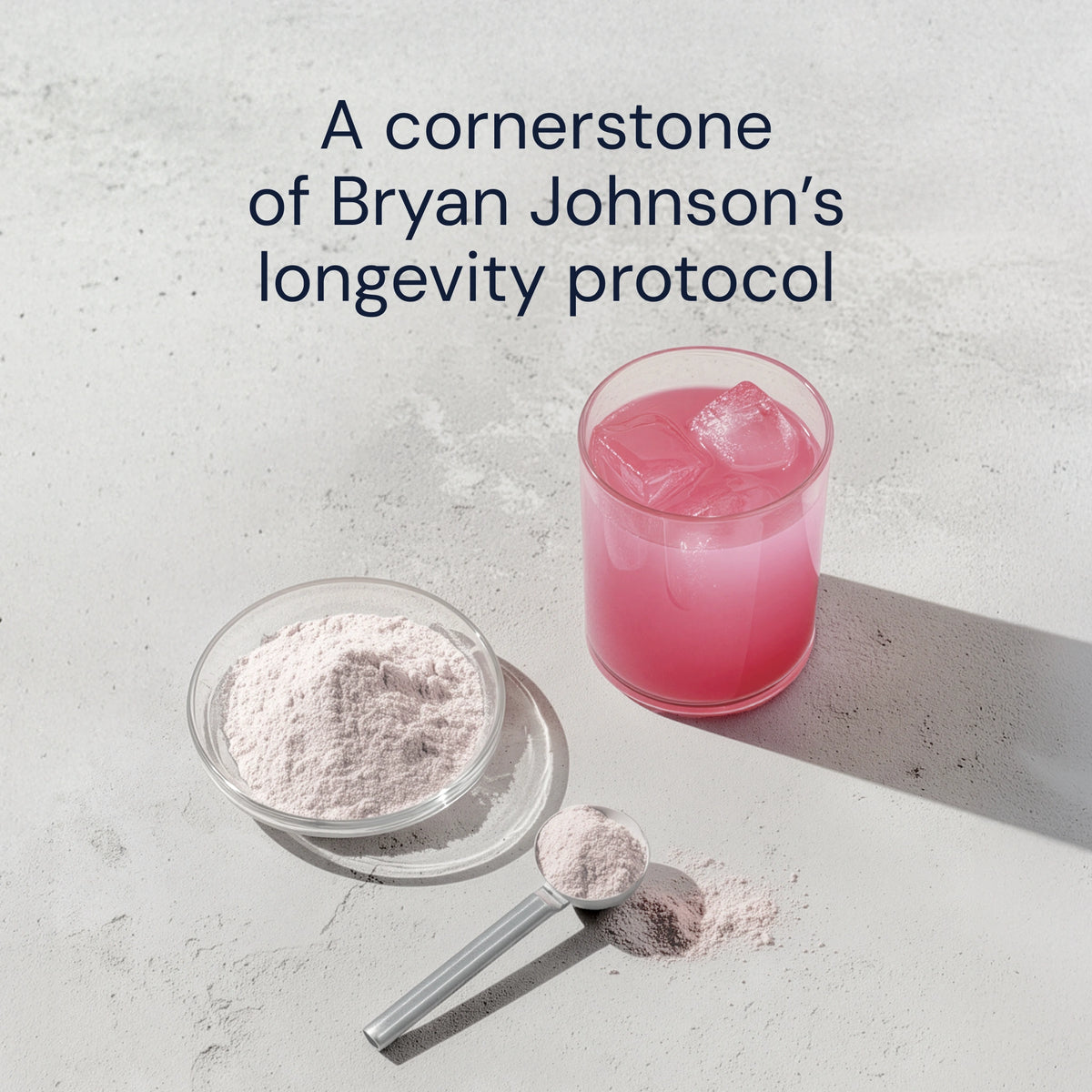 Pink powder in a bowl with a glass of pink liquid on a light gray background, labeled as a 'cornerstone of Bryan Johnson's longevity protocol'.