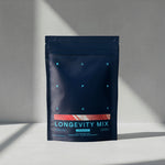 Dark blue package labeled 'Longevity Mix' on a light gray background