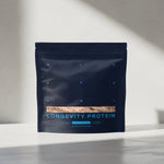 Protein package labeled 'Longevity Protein' on a neutral background