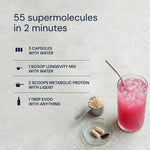 Supplement regimen with a glass of pink drink, scoop, and capsules on a light background