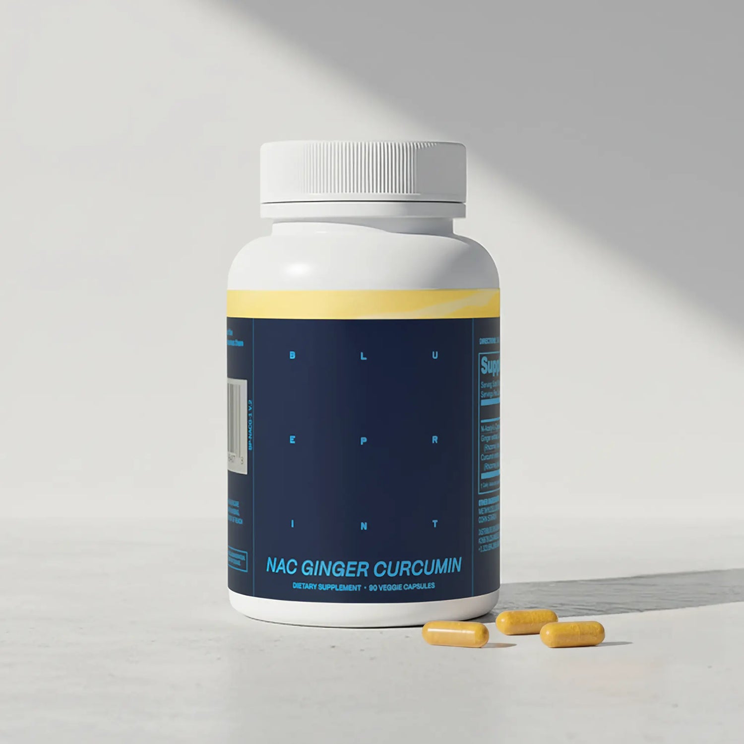 Supplement bottle labeled 'NAC Ginger Curcumin' on a light gray background