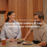Two people sharing a meal, illustrating advanced metabolic tracking in the Blueprint protocol