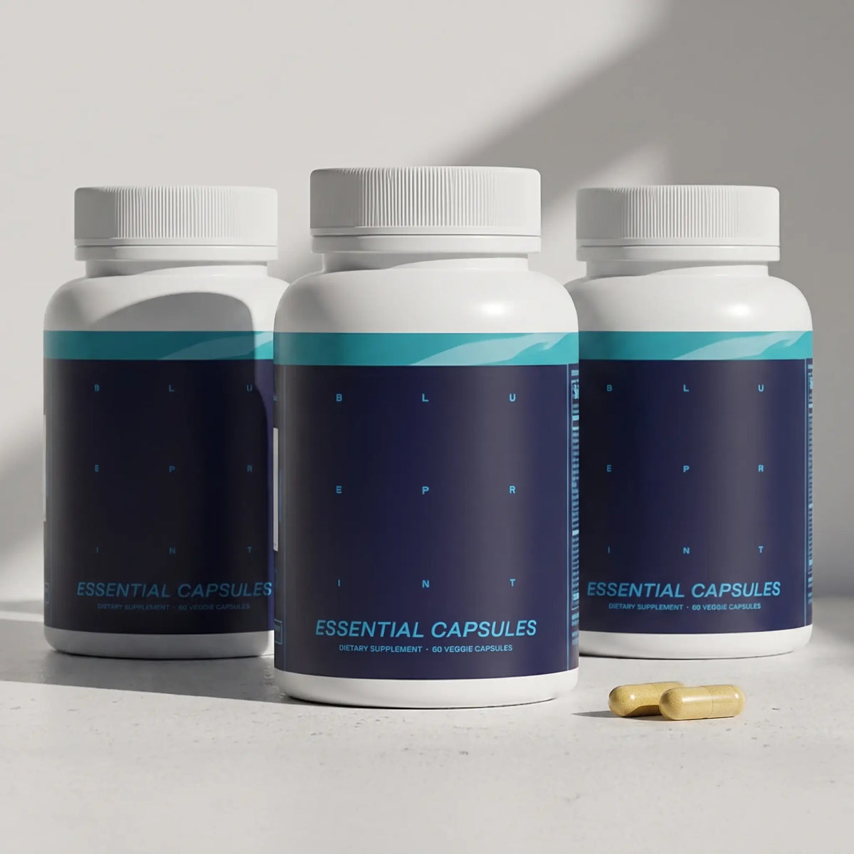Three bottles of Blueprint Essential Capsules, the daily longevity multivitamin