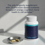 Supplement bottle labeled 'Essential Capsules' with two capsules on a tray against a gray background.