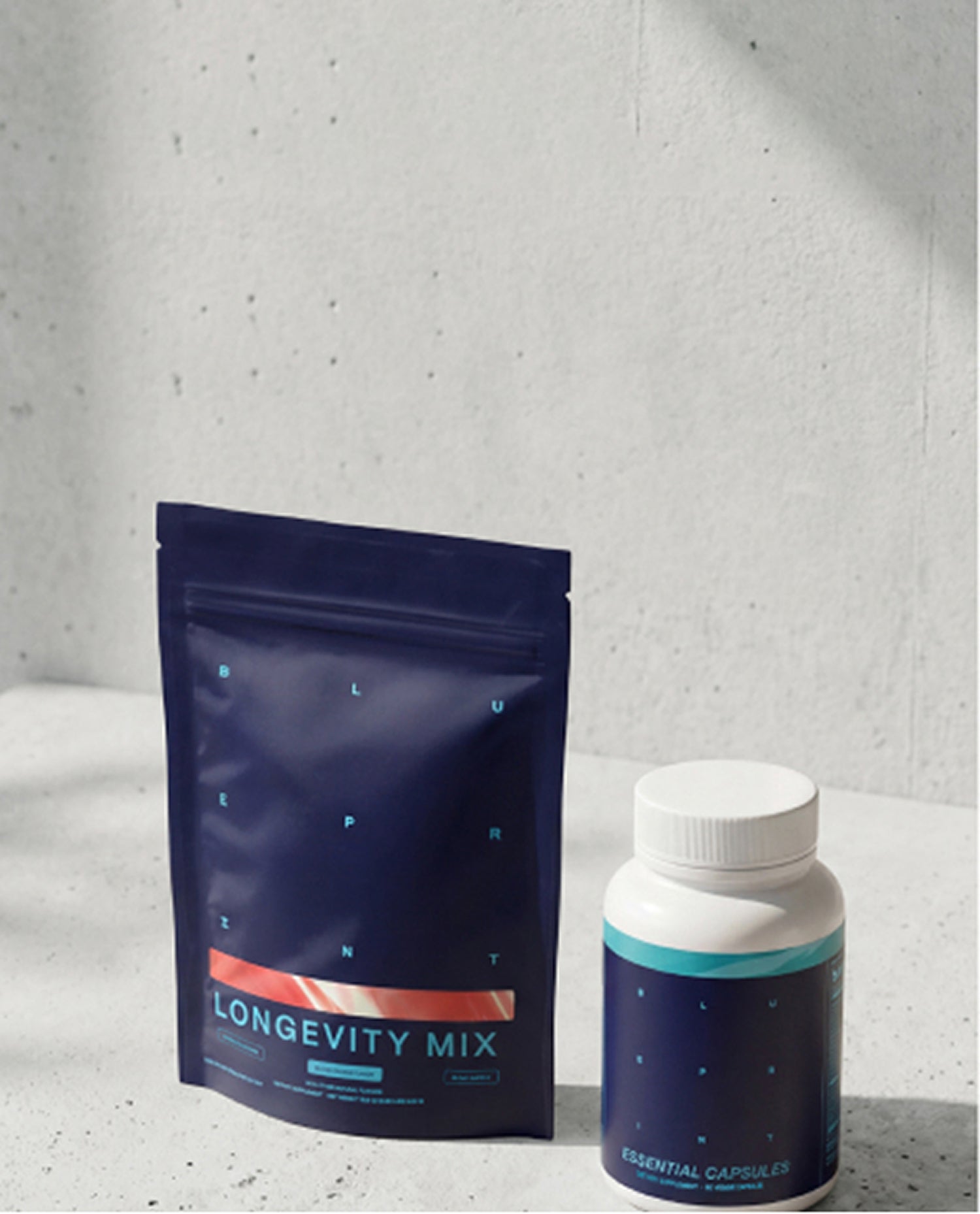Longevity Mix package and bottle on a light gray background