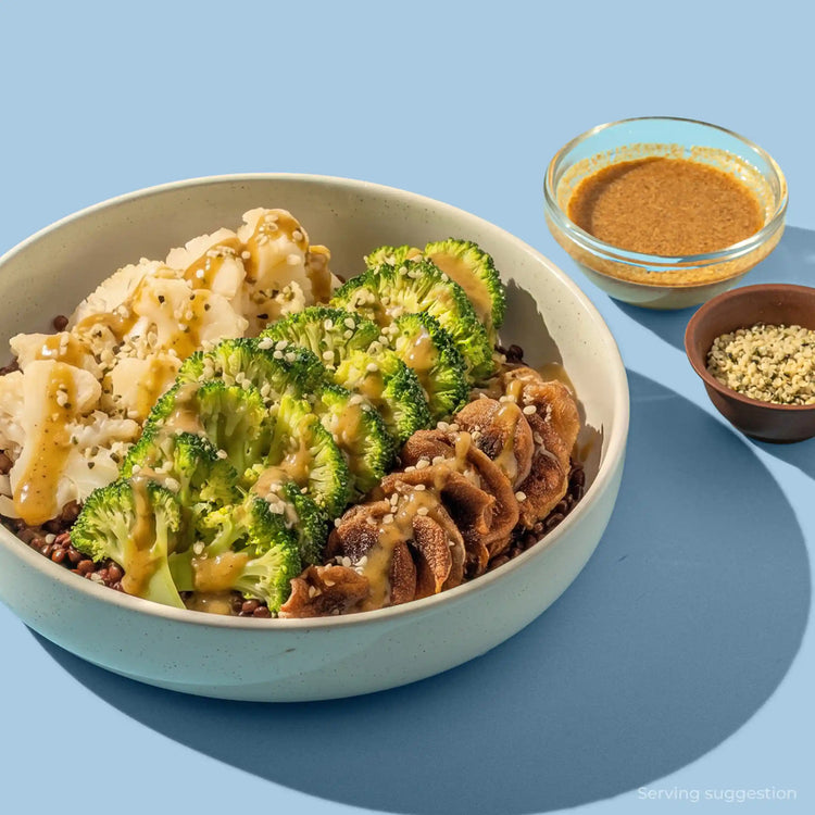 Blueprint longevity meal bowl with sliced beef, broccoli and rice with sesame dipping sauce, free from seed oils