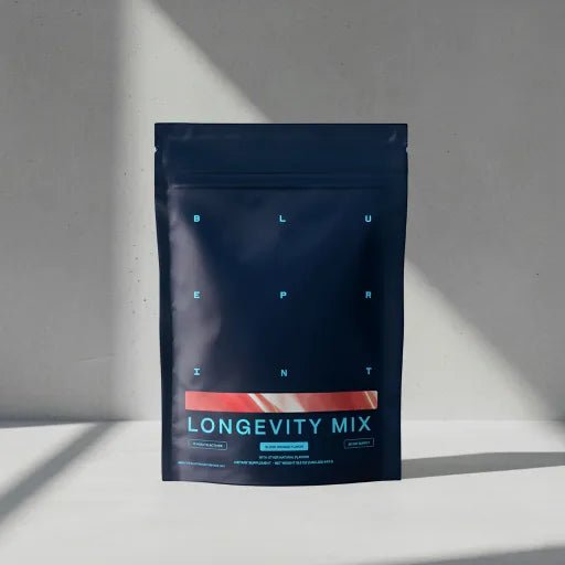 Blueprint Longevity Mix pouch standing on a sunlit white surface