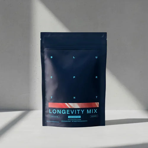 Blueprint Longevity Mix pouch standing on a sunlit white surface