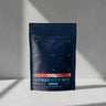 Blueprint Longevity Mix pouch standing on a sunlit white surface