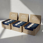 Three boxes of Blueprint Cocoa macadamia bars in a three-pack