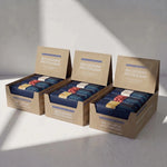Three boxes of Blueprint macadamia bars in the variety three-pack