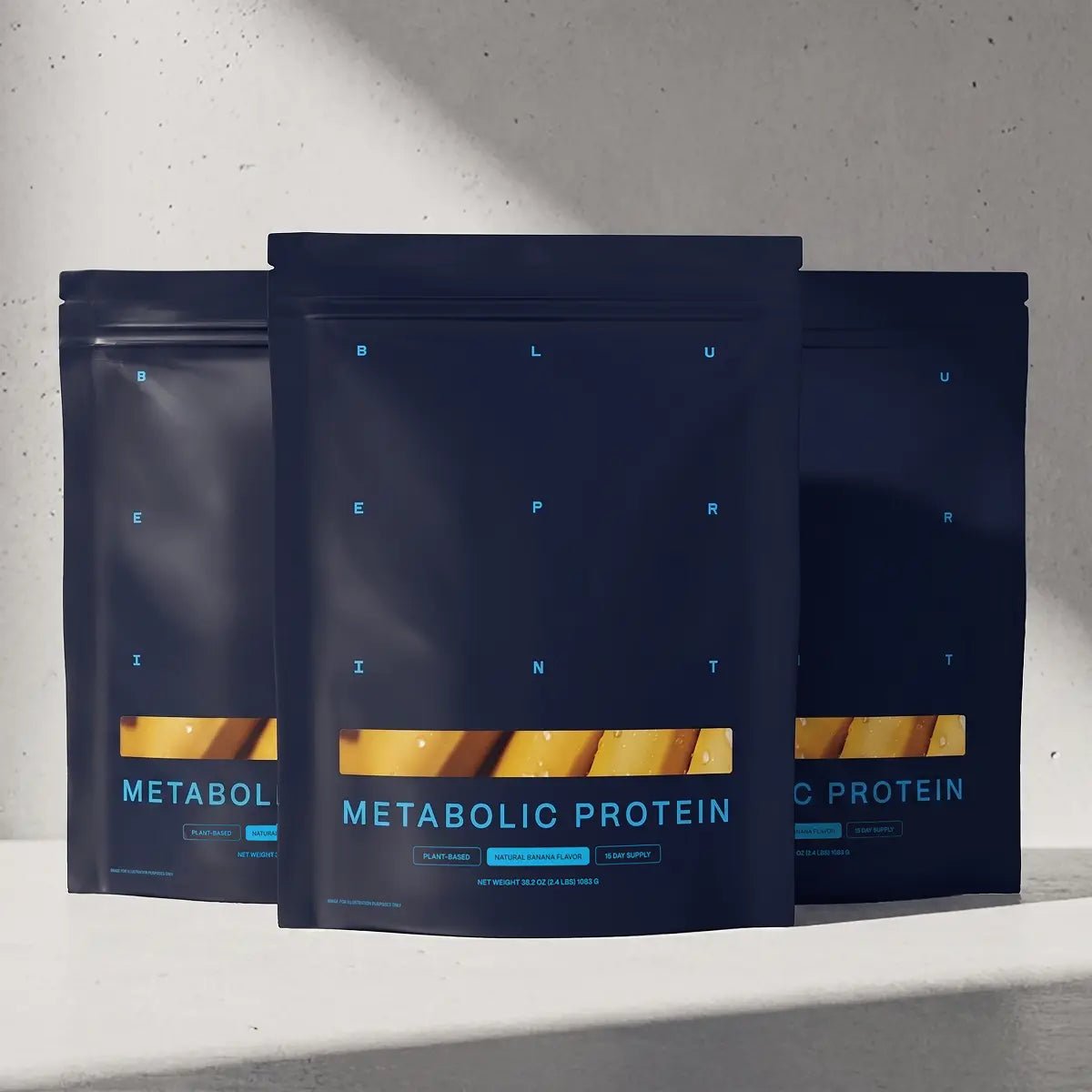 Three pouches of Blueprint Metabolic Protein in banana, a three-pack