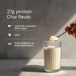 Protein powder being added to a glass with text about protein content and usage.