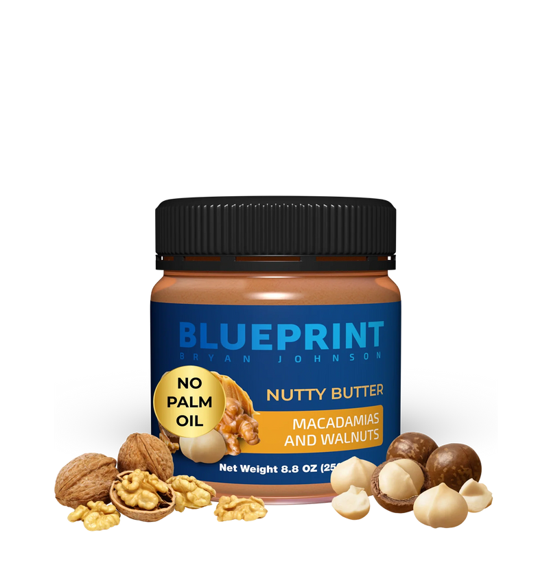 Jar of Blueprint Nutty Butter with macadamias and walnuts on a white background