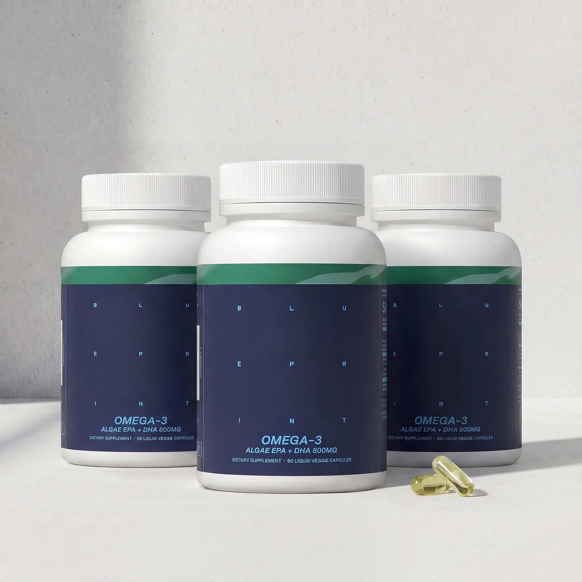 Three bottles of Blueprint Omega-3 supplement in a three-pack for daily longevity support