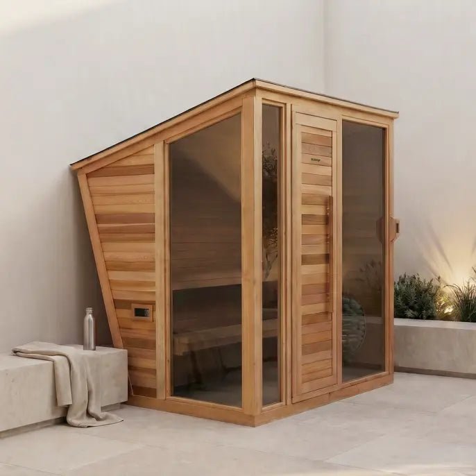 Wooden outdoor shower cabin with glass doors on a patio