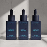 Three dropper bottles of Blueprint Serum from the longevity skincare line