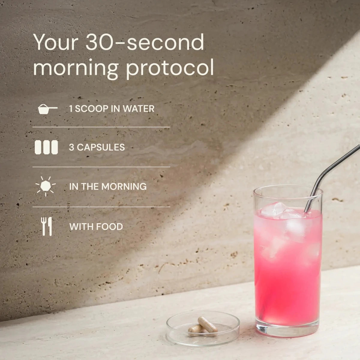 Glass of pink drink with a straw on a light surface, accompanied by text about a 30-second morning protocol.