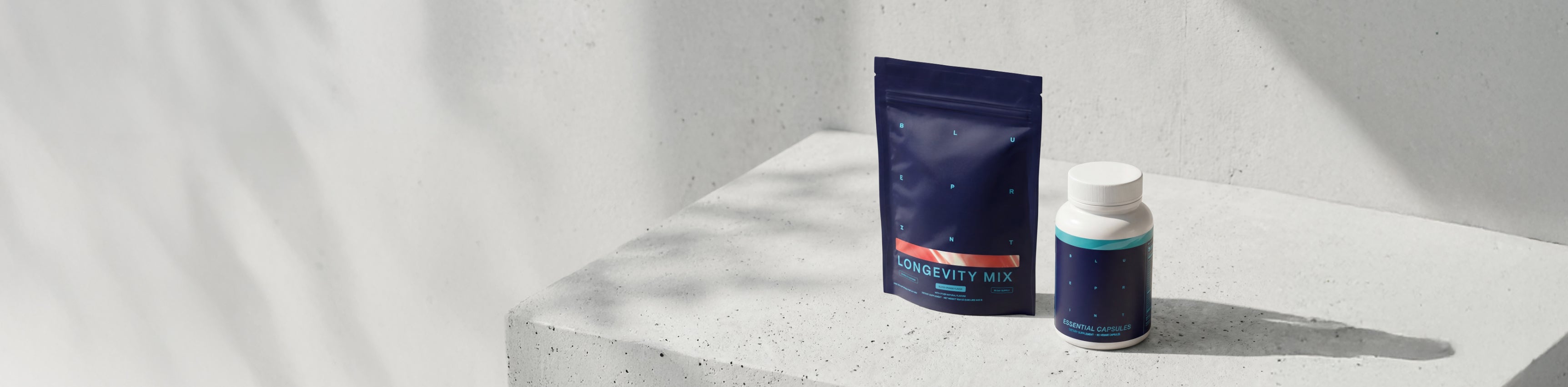 Supplement package with a blue and white container on a light gray surface