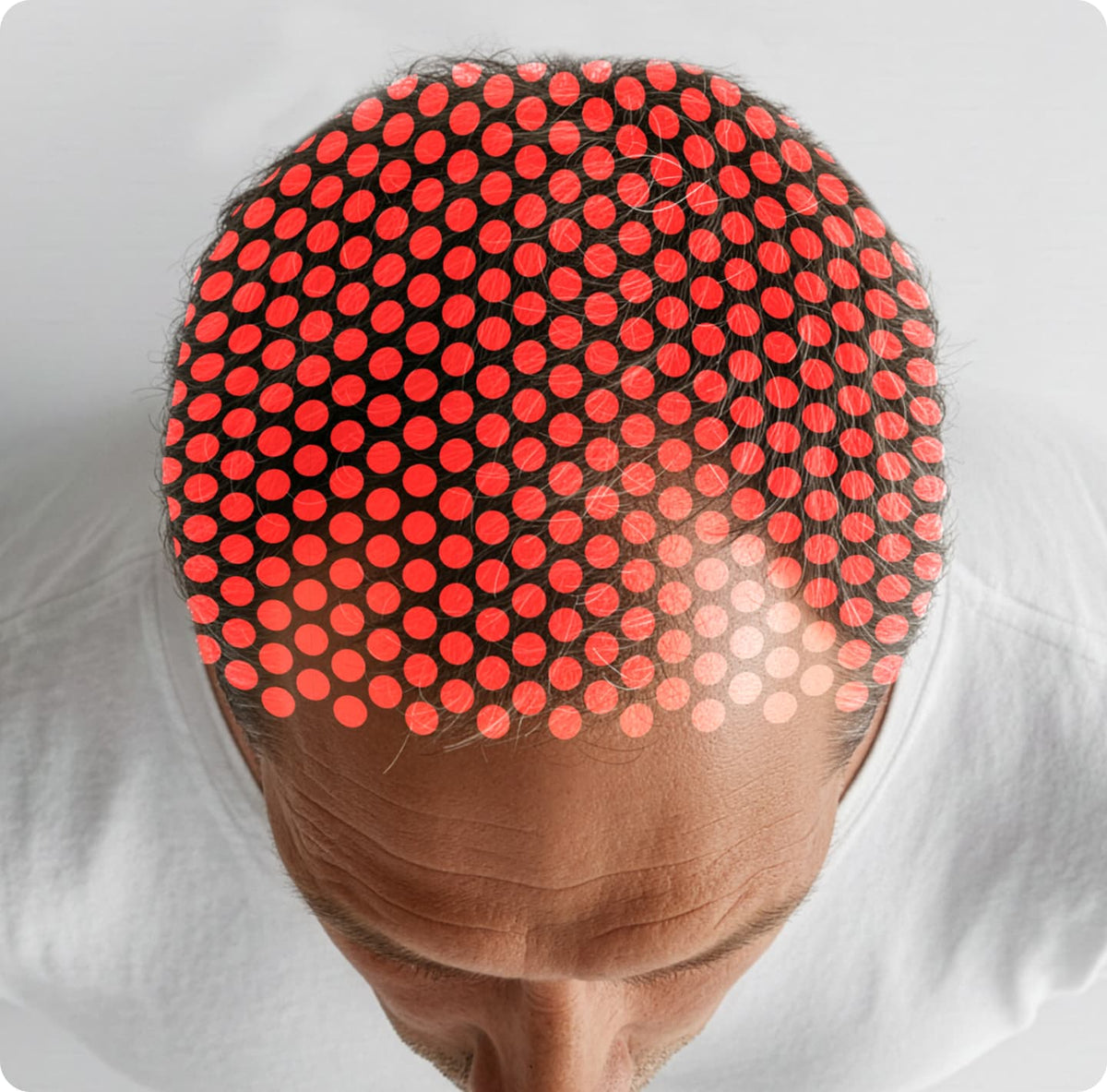 Person wearing a cap with red and black pattern on a white background